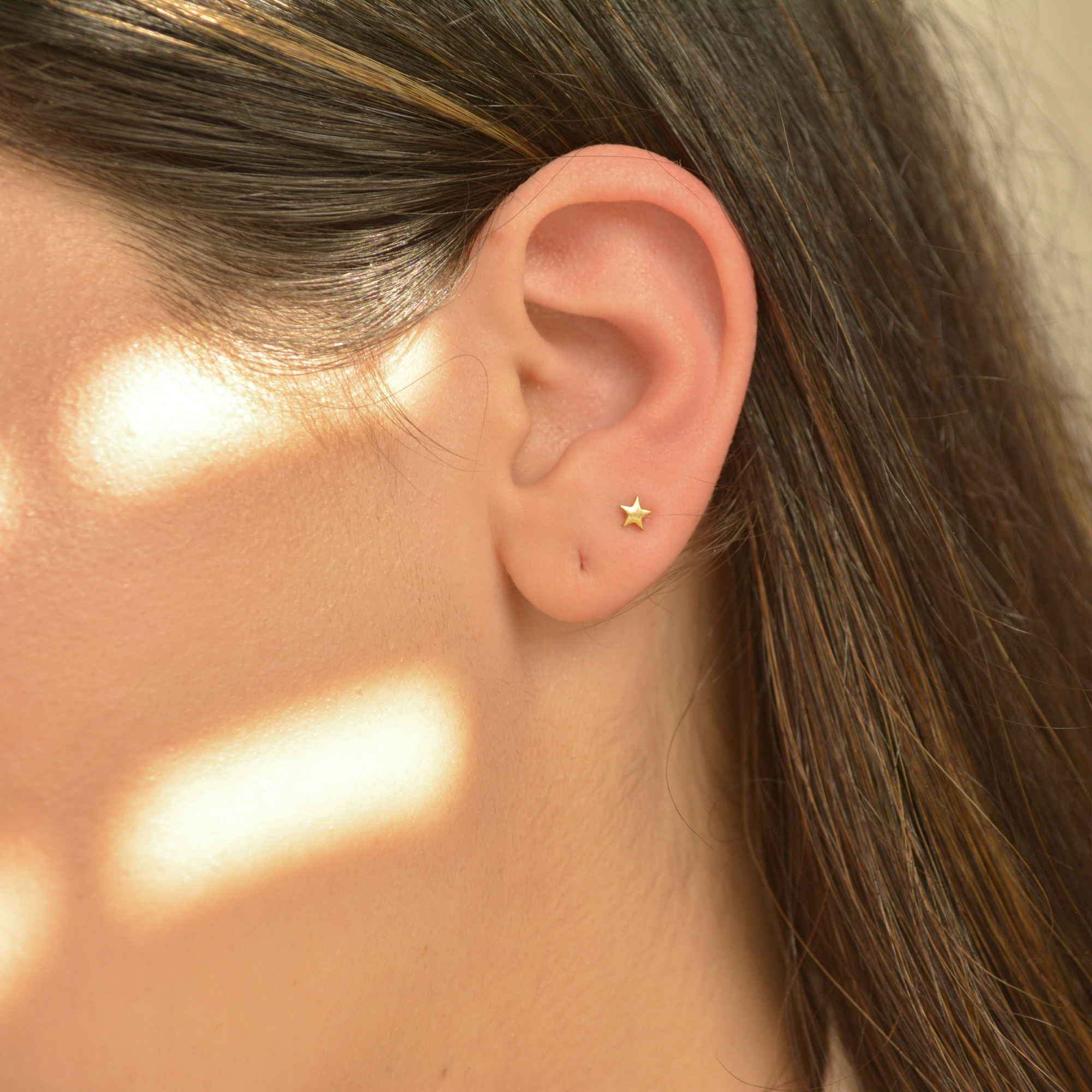 Tiny online star earrings
