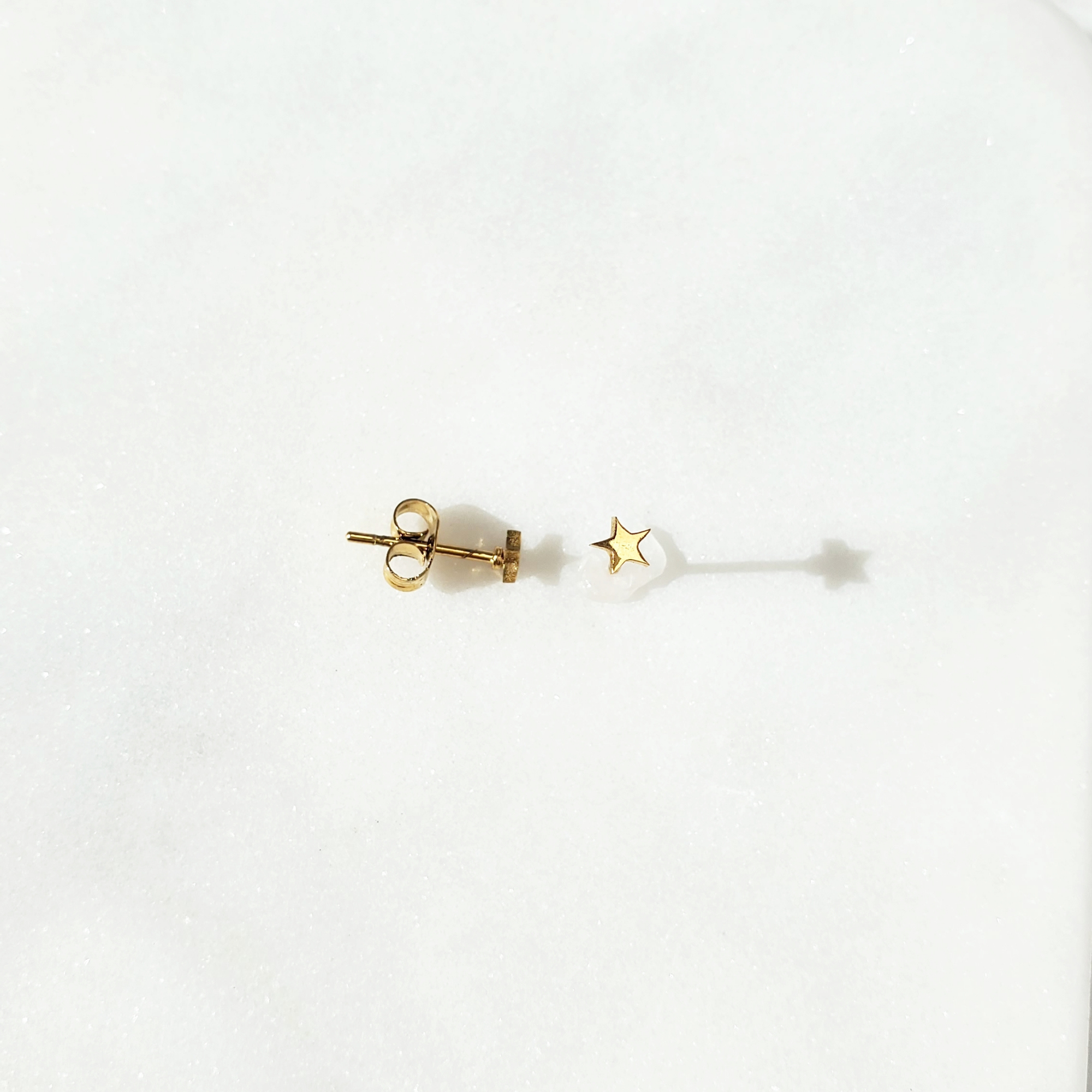 Tiny hot sale star studs